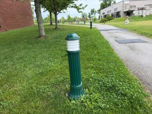 short light post along sidewalk